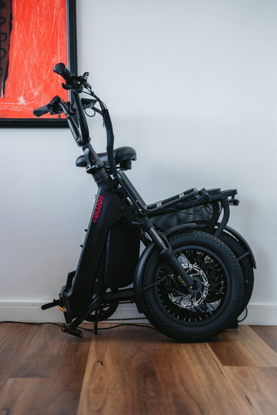 Black Vamos Doblez 2026 electric bike folded for compact storage
